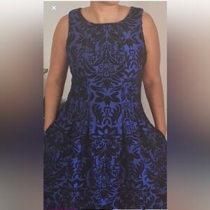 Woman’s blue and black Gabby Skye dress size 12 NWT